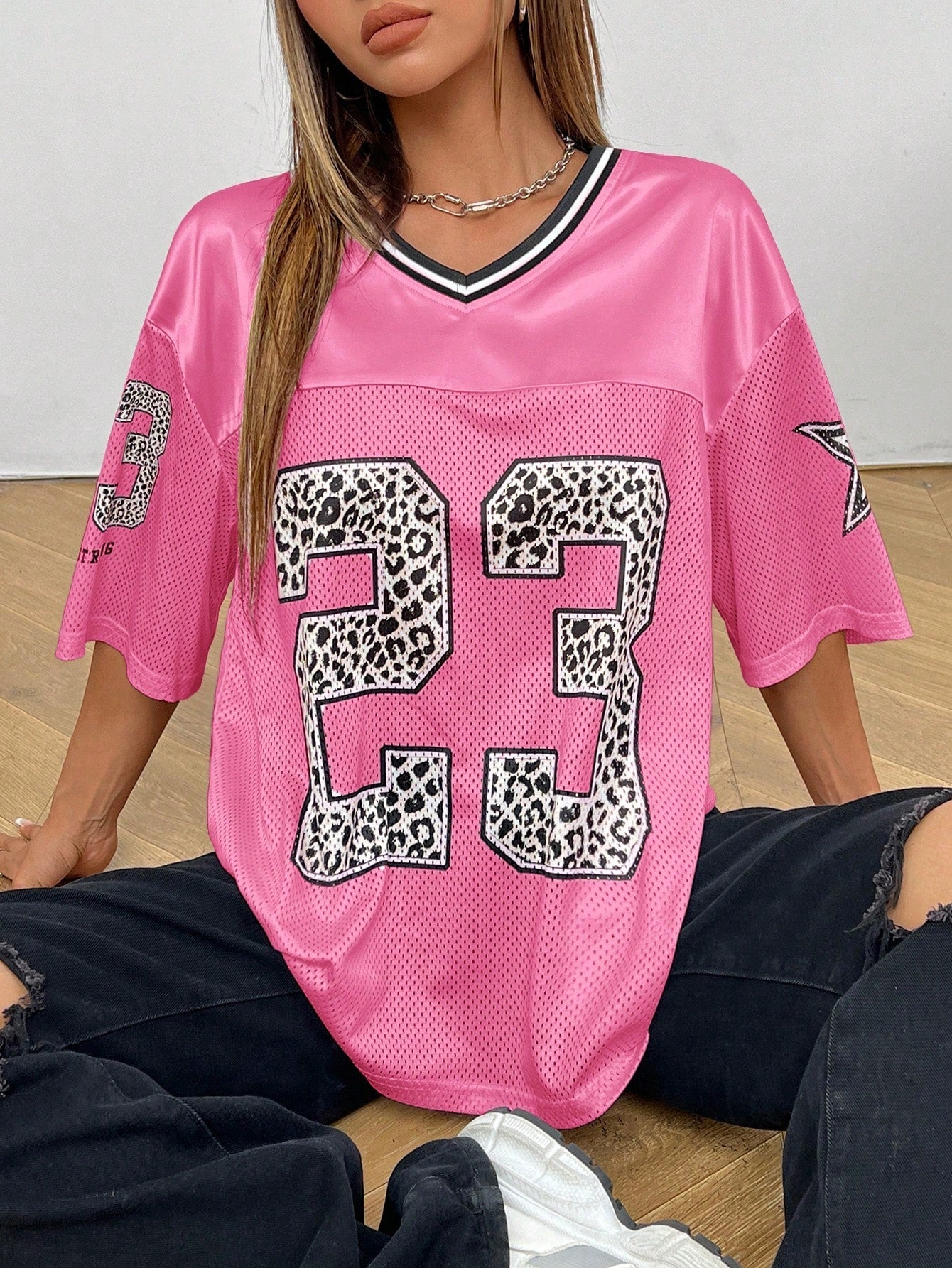 Savanna | Women’s Oversized V Neck Short Sleeve Animal Print Top 11